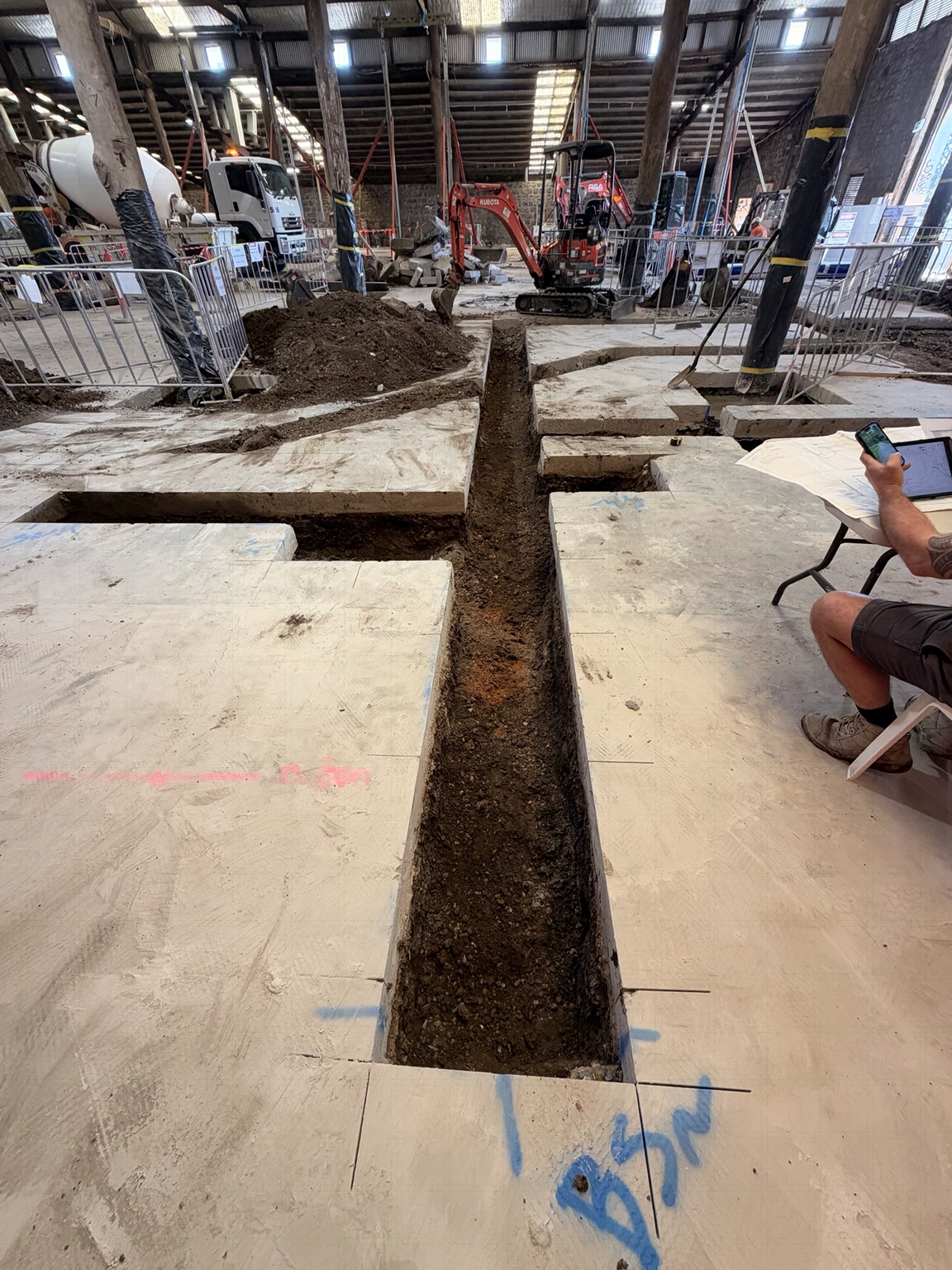 Trenching underway through the warehouse slab in Brunswick